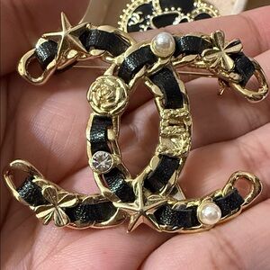 Elegant Gold and Black Designer Brooch